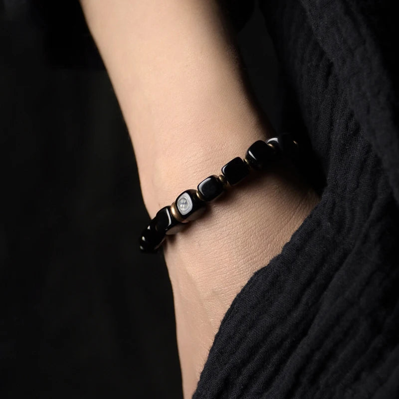The Obsidian & Copper Cuff — Handmade Protection Bracelet
